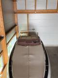 abbate-elite-33-occasion-suisse-lac-leman-vue-exterieure-vedette-sous-hangar-35